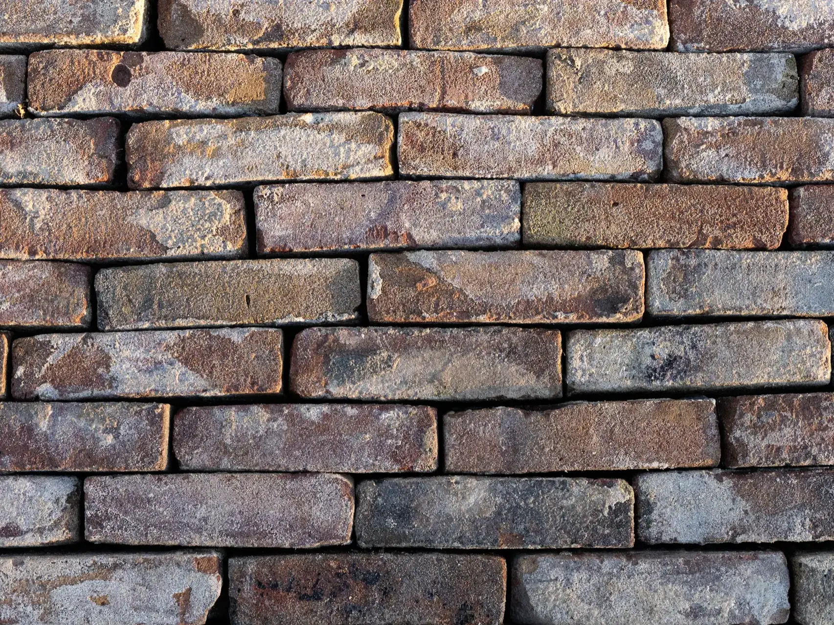 Old sand-faced moulded bricks
