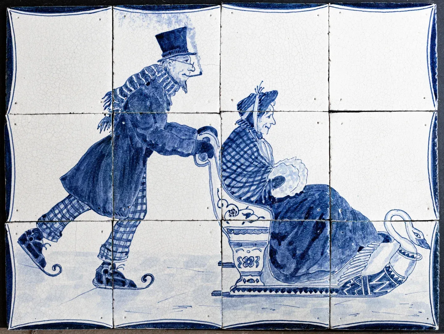 Panneau ancien de carreaux bleus de Delft, peint à la main et représentant un traîneau