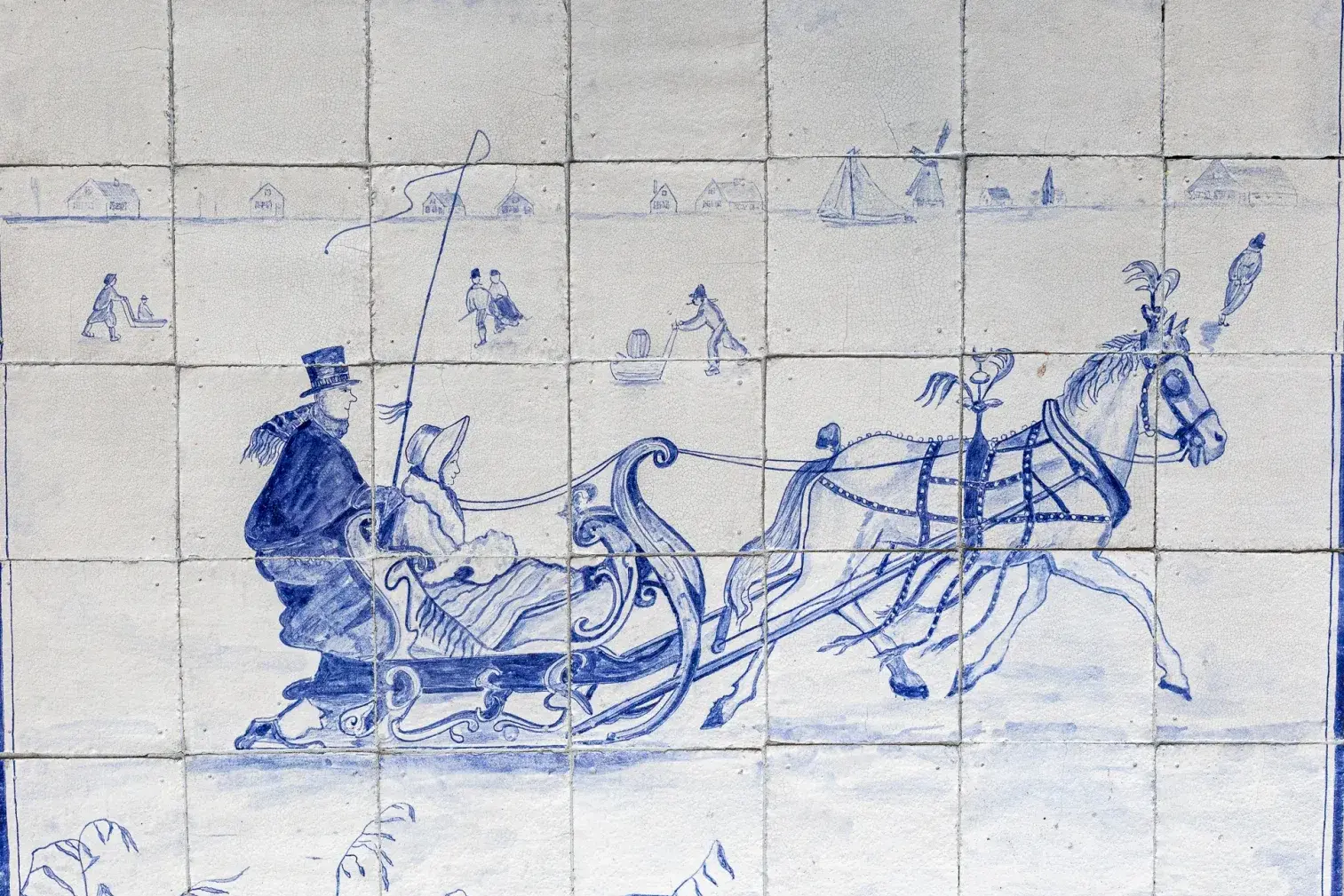 Antique Delft-blue tile panel of 35 tiles depicting a horse and sleigh