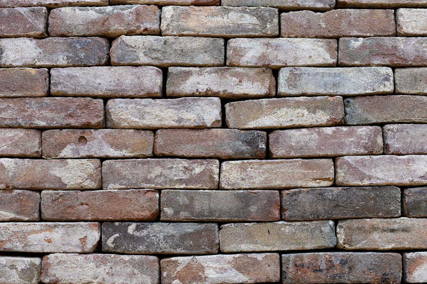 Antique red, brown and purple moulded brick