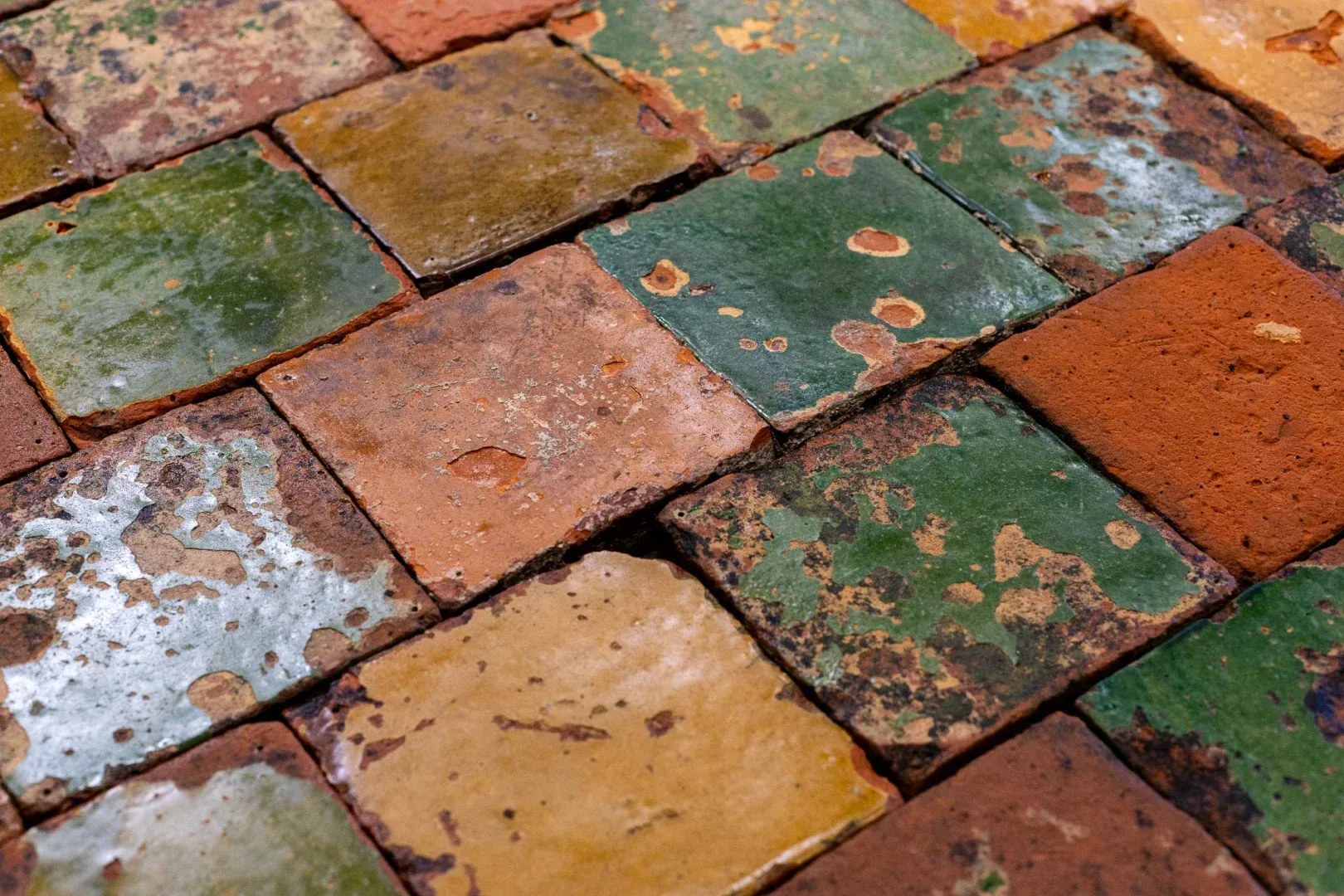 Mixed antique terracotta floor tiles