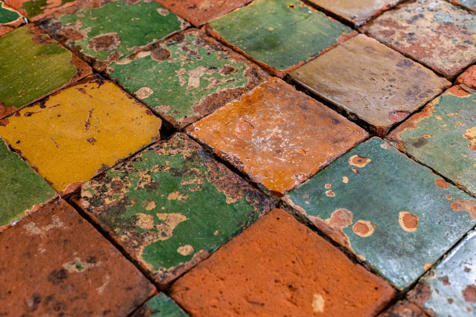 Glazed tiles showing signs of use
