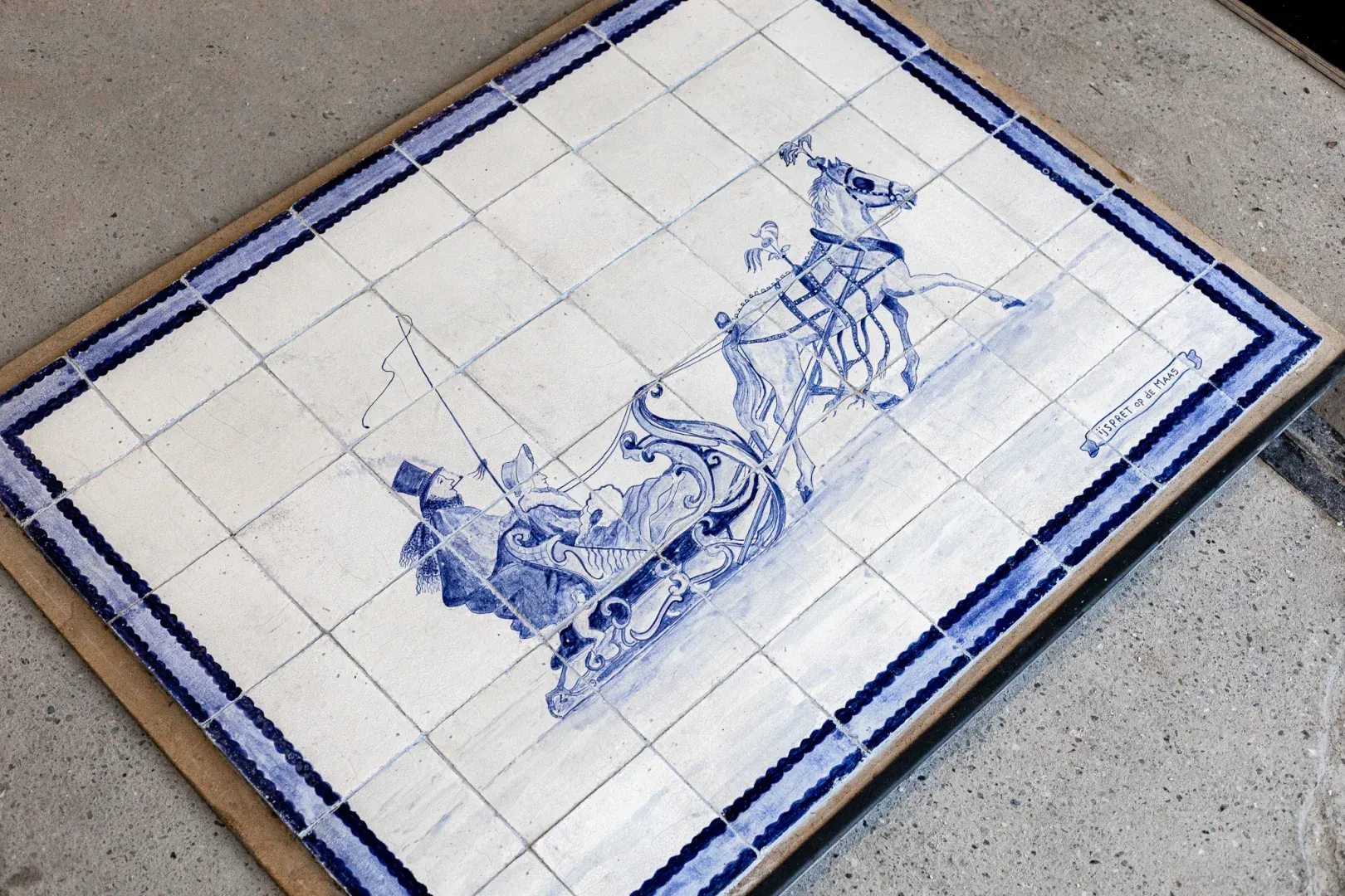 Old Dutch tile panel depicting a horse and sleigh