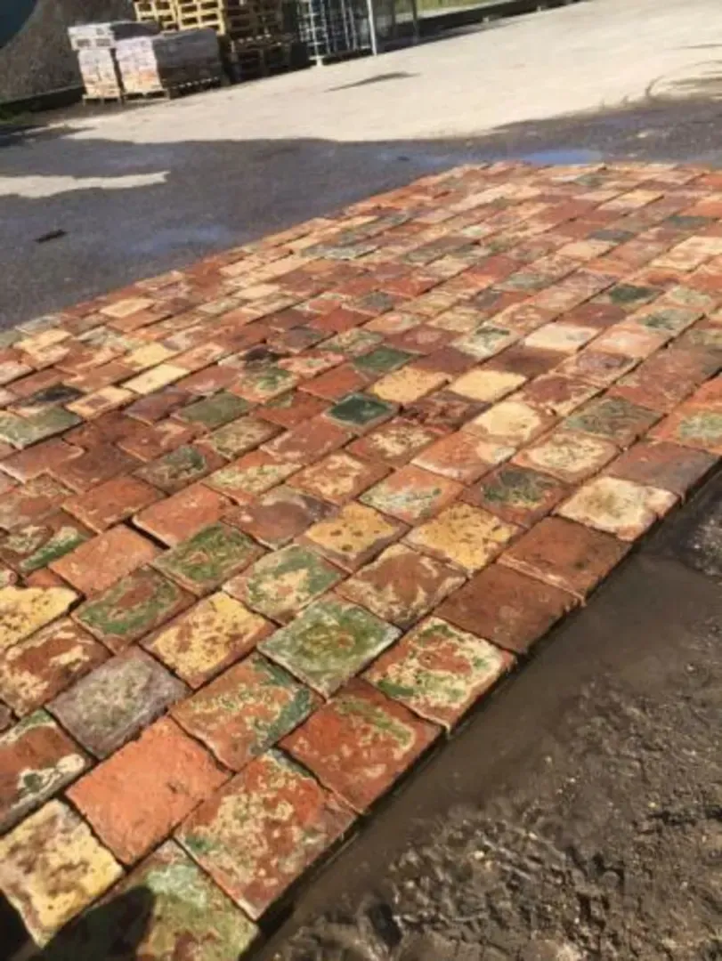 Old glazed terracotta floor tiles