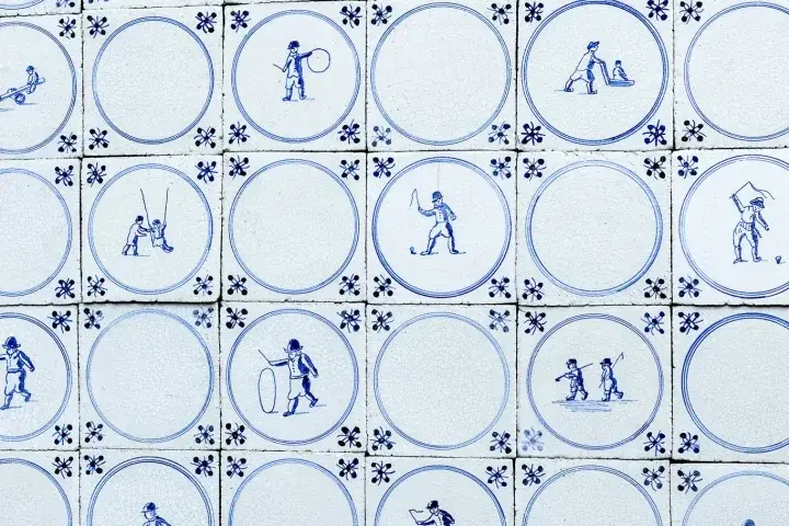 Old hand-painted earthenware tiles