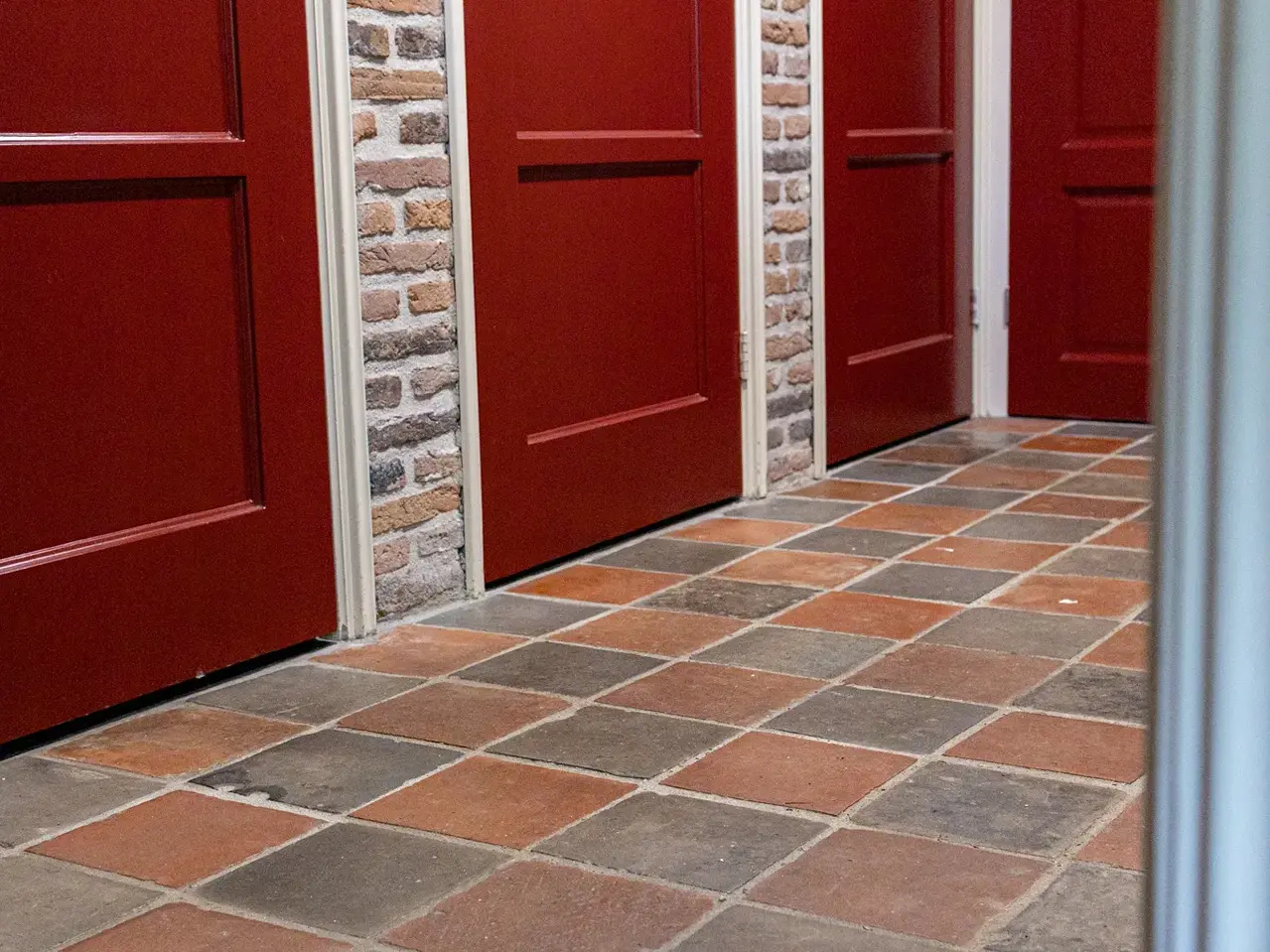 Antique floor tiles laid in a floor