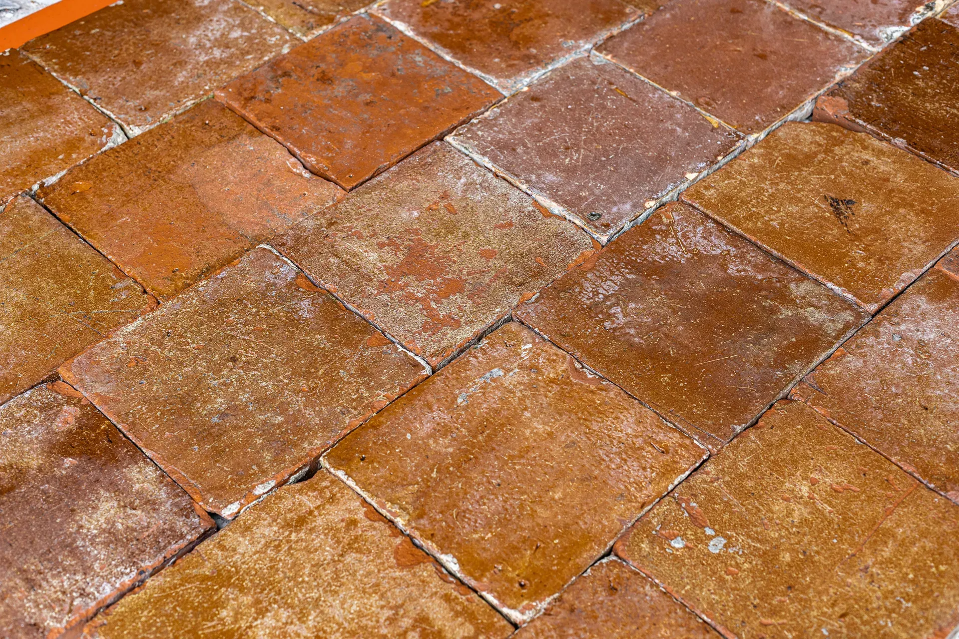 Brown terracotta floor tiles, 21 x 21