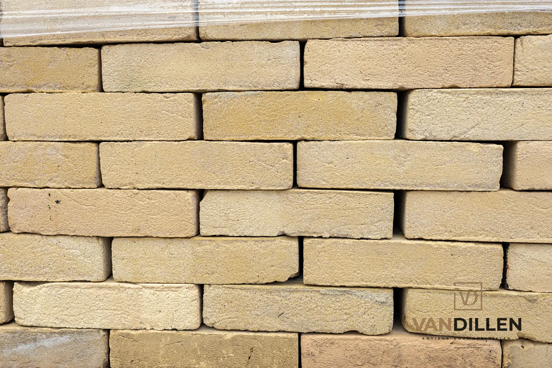 Yellow bricks cleaned of mortar