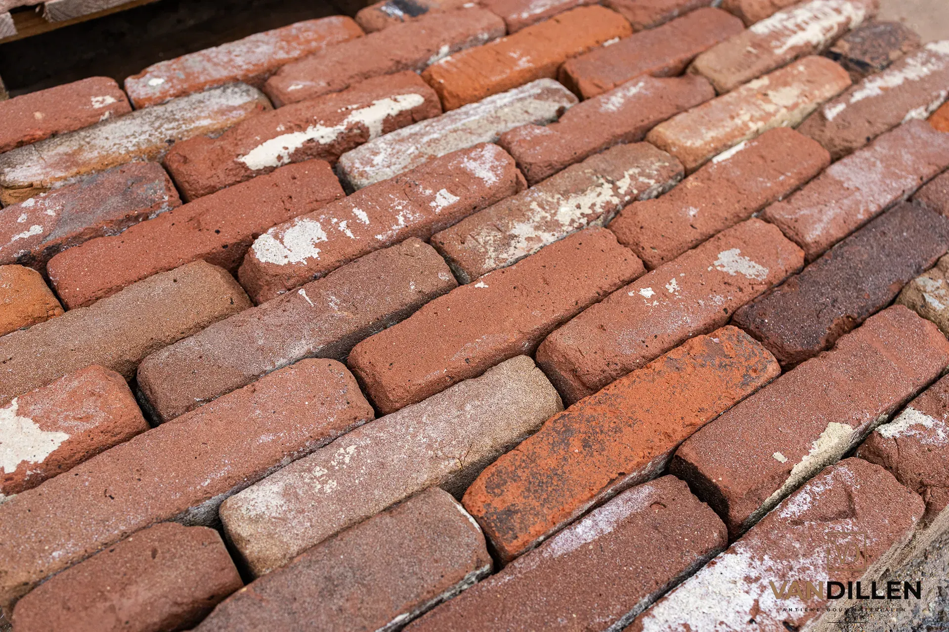 Red-purple bricks cleaned of mortar