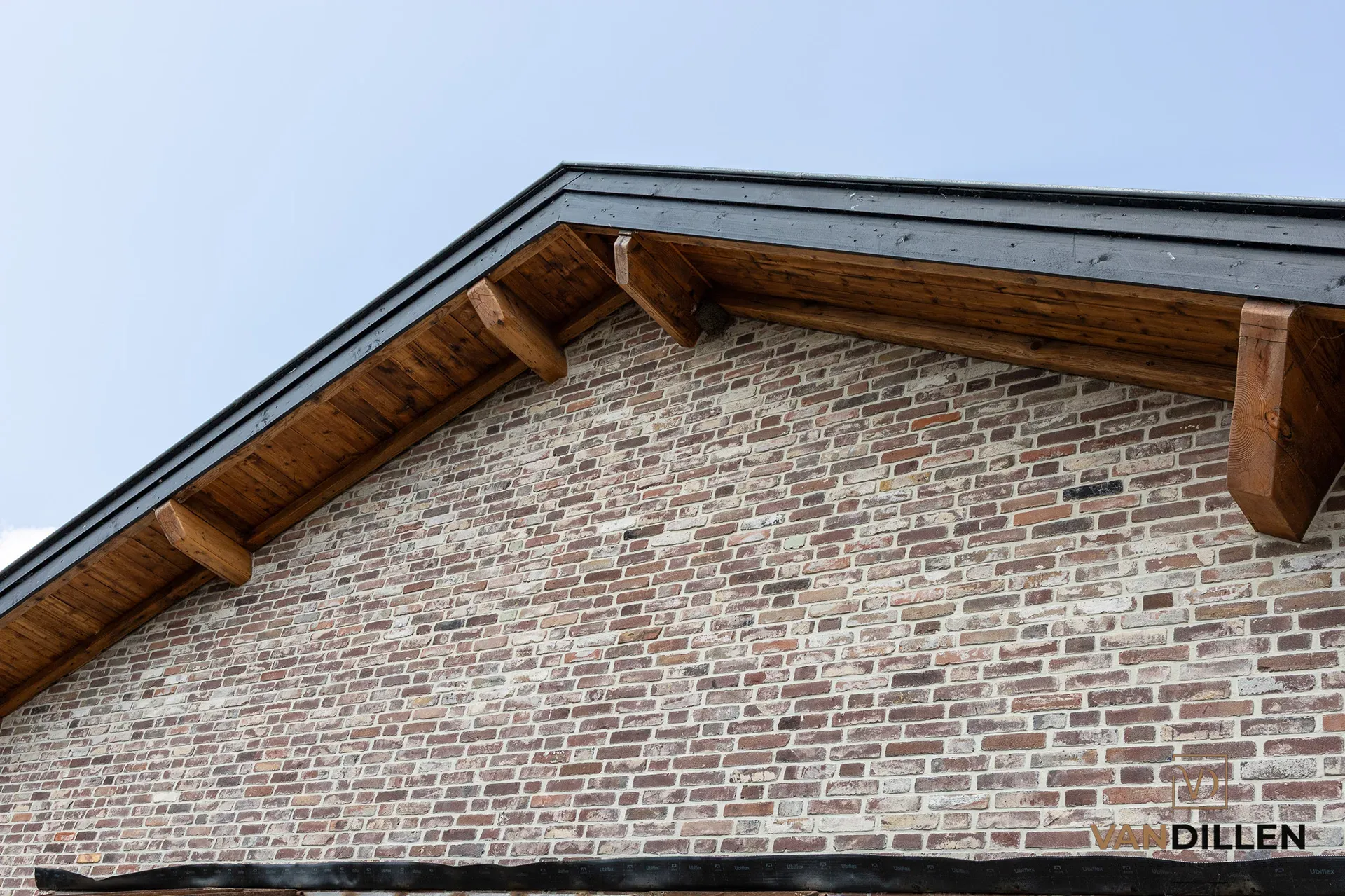 Facade of cleaned reclaimed moulded bricks