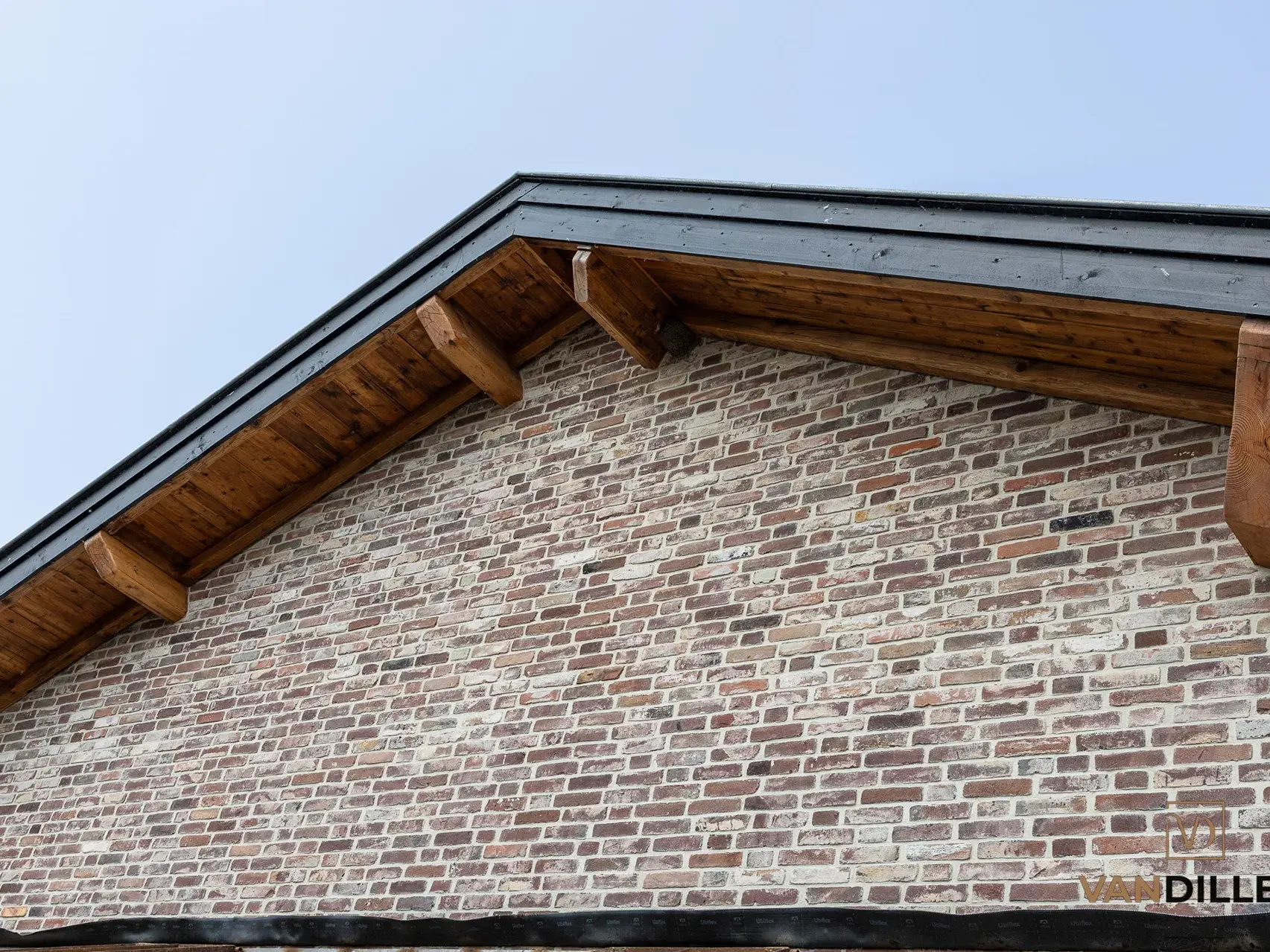 Facade of cleaned reclaimed moulded bricks