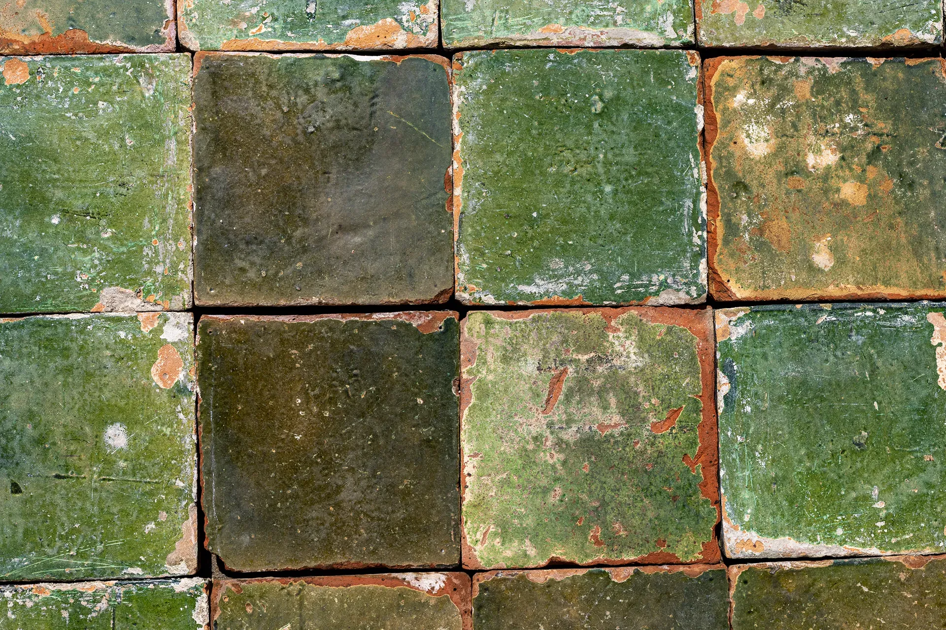 Antique tiles with green glaze