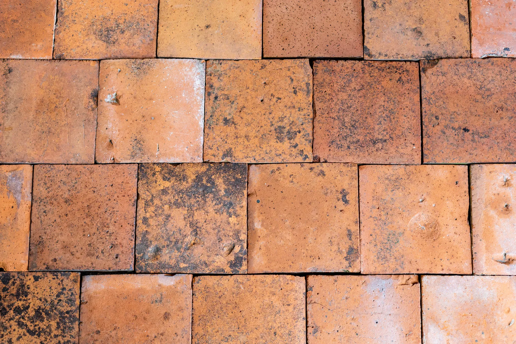 Antieke terracotta plavuizen