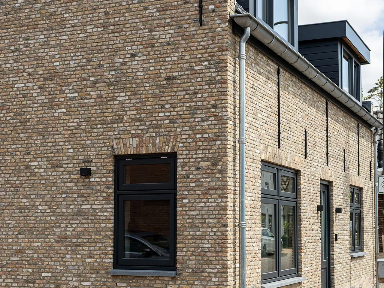 Nieuwbouw met oude gebikte stenen impregneren