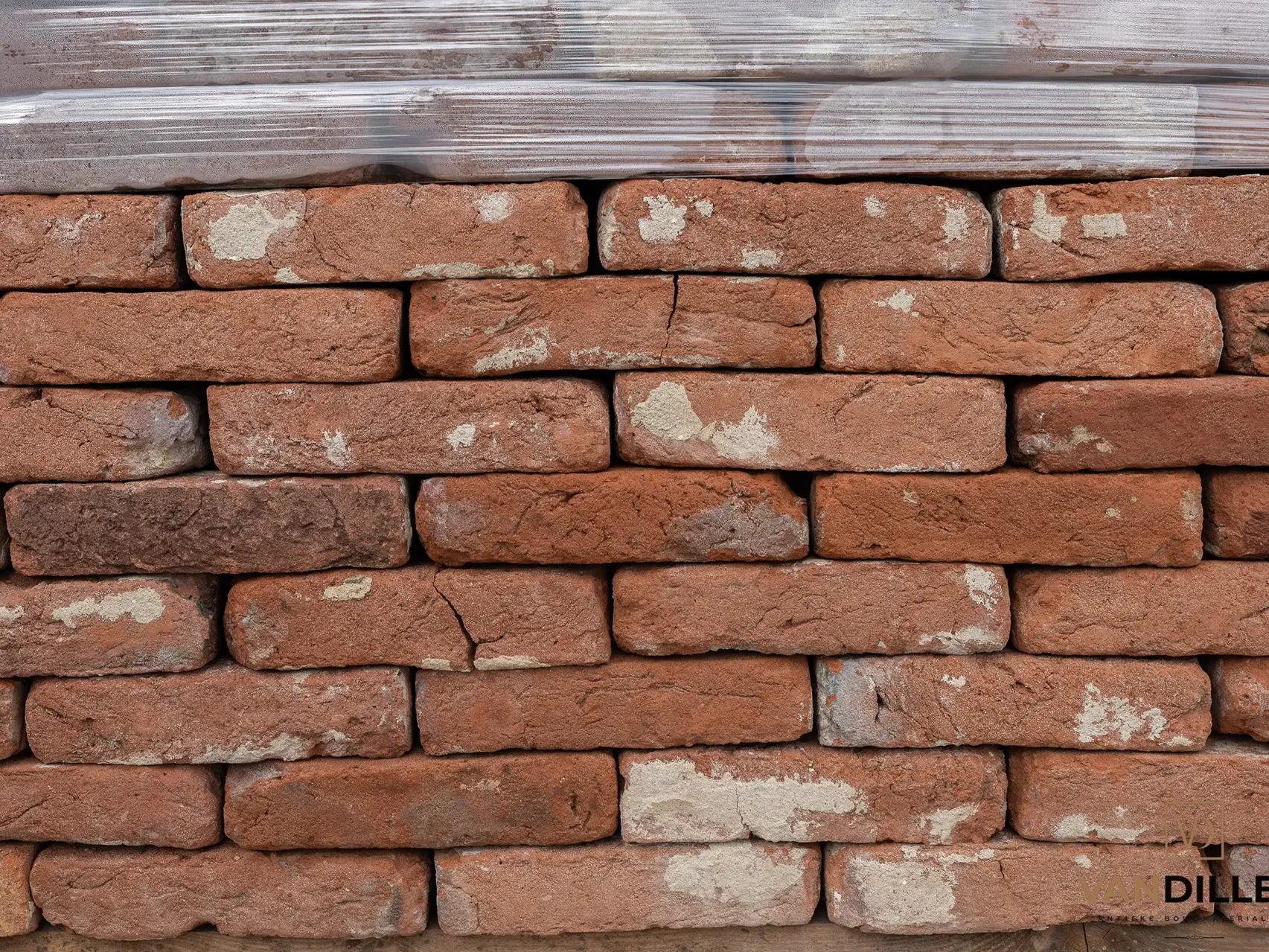 Antique red, purple and orange handmade bricks in Waal format