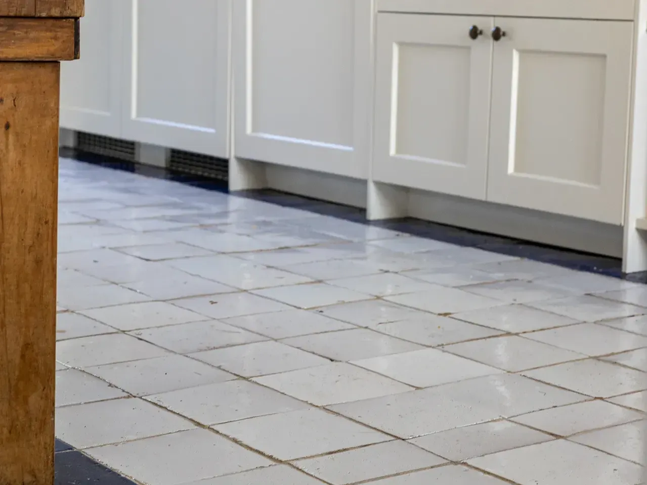 Floor of traditional Dutch terracotta tiles in Weesp