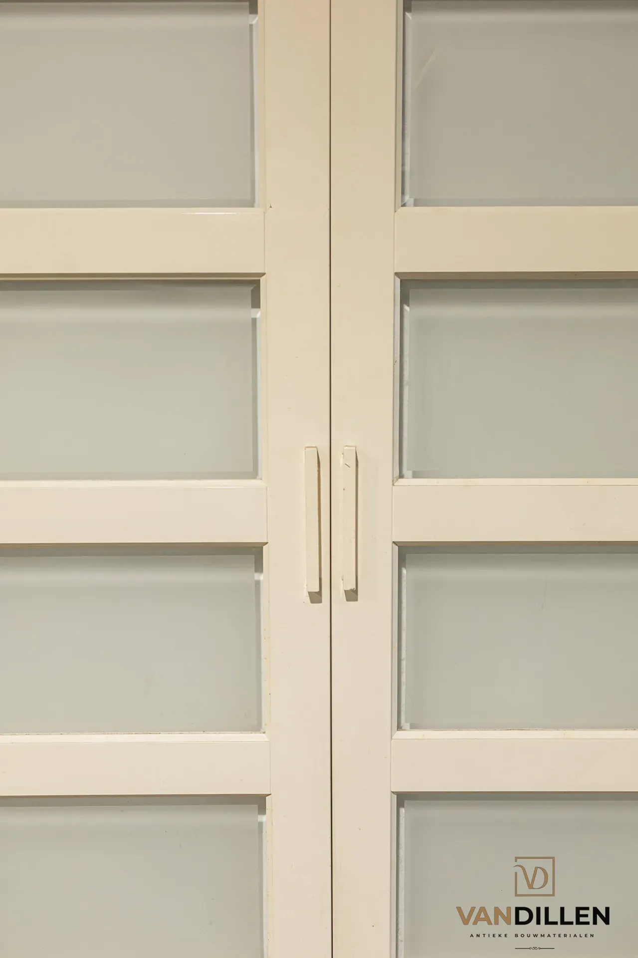 No. 23 internal dividing doors with obscured glass and glazing bars