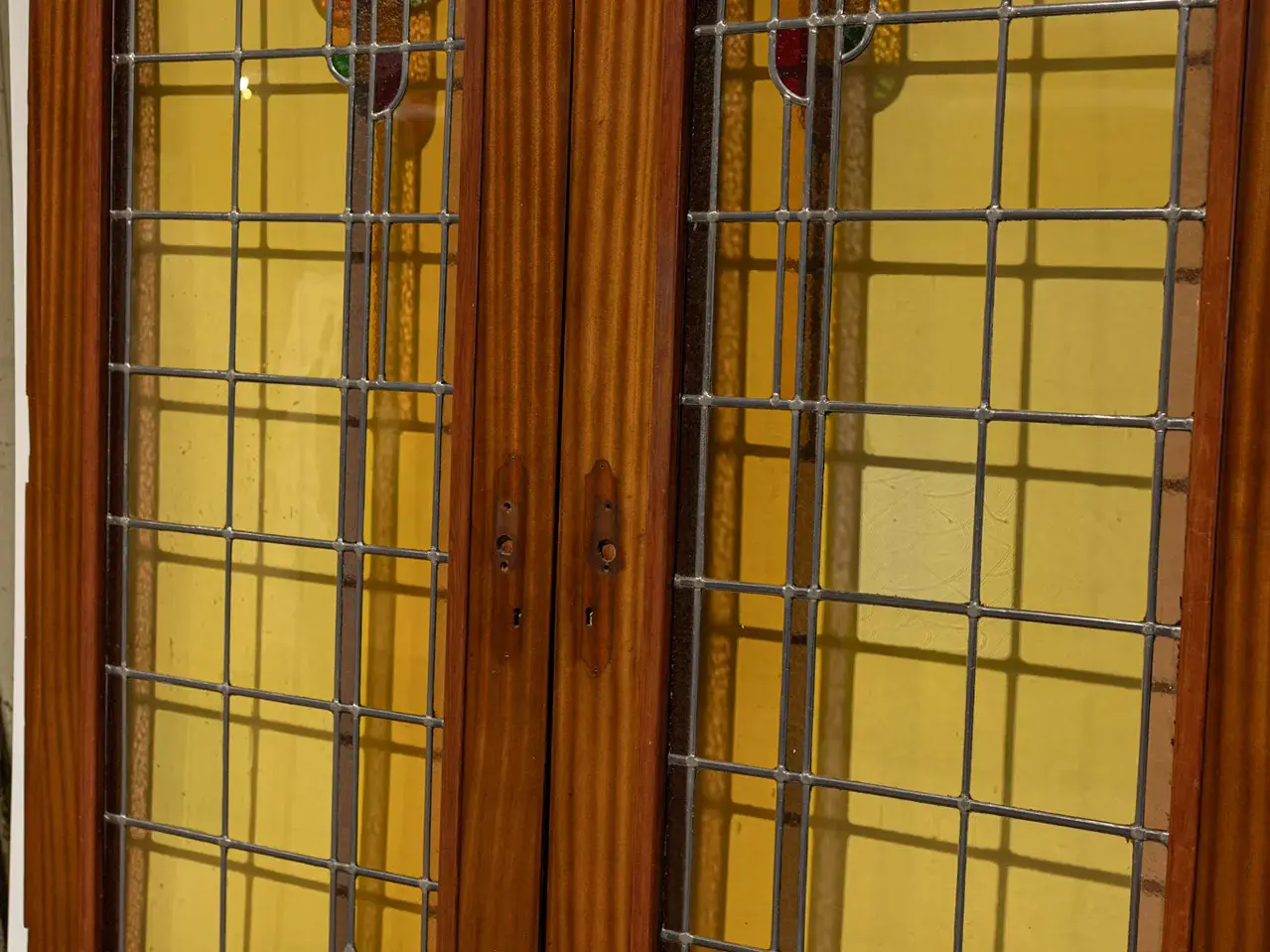 Antique ensuite doors with stained glass