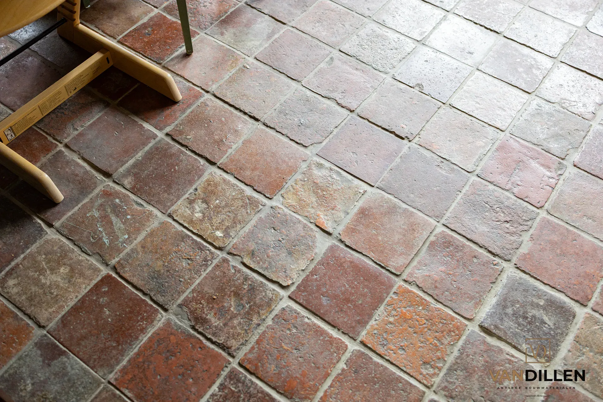 Old French terracotta tiles in a country interior in Middelstum
