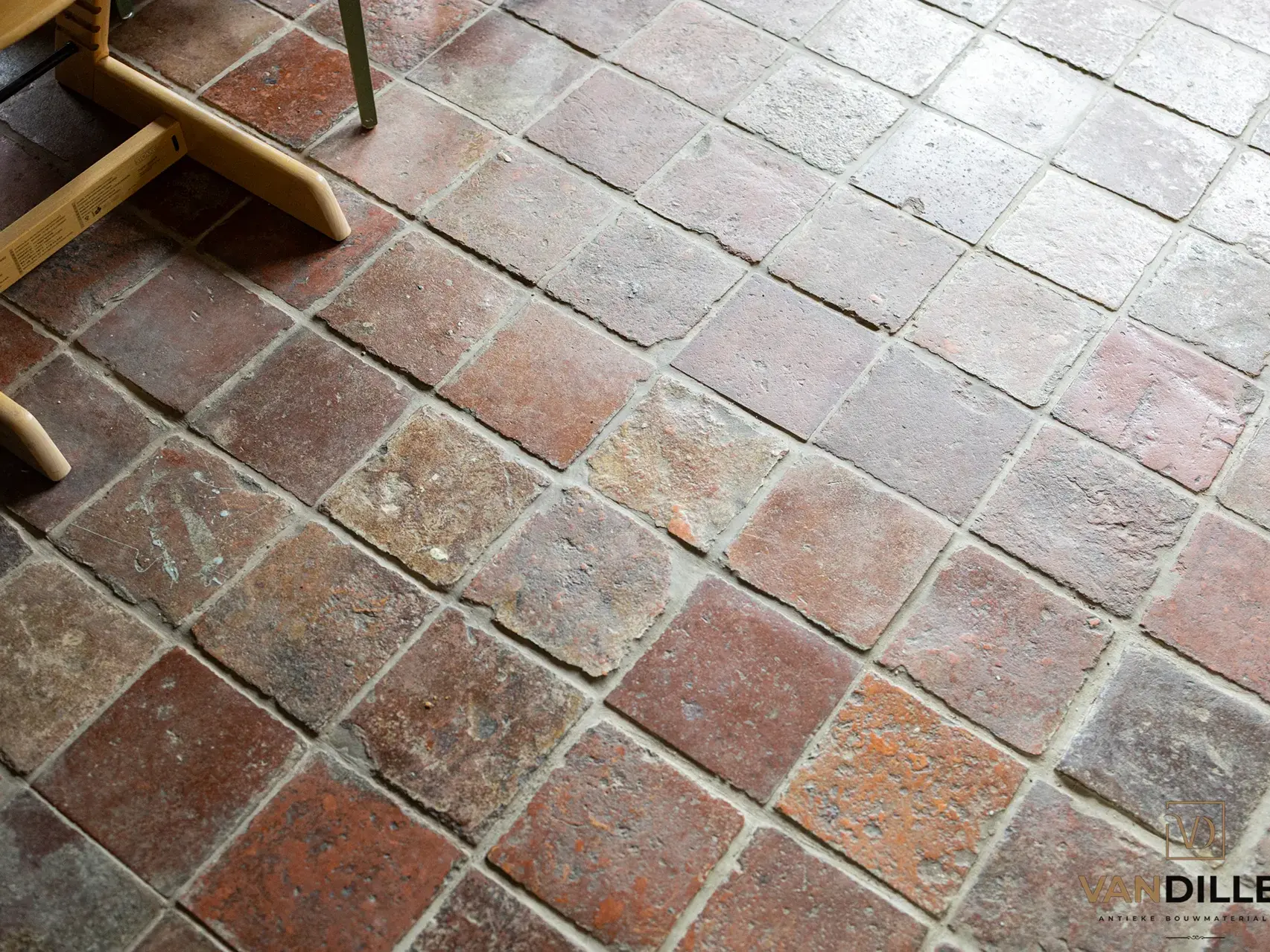 Old French terracotta tiles in a country interior in Middelstum