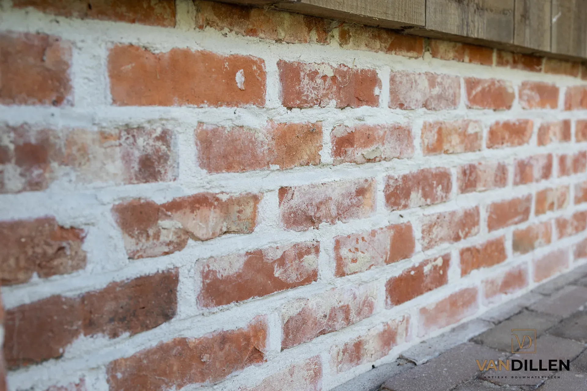 Old red moulded bricks used as a plinth