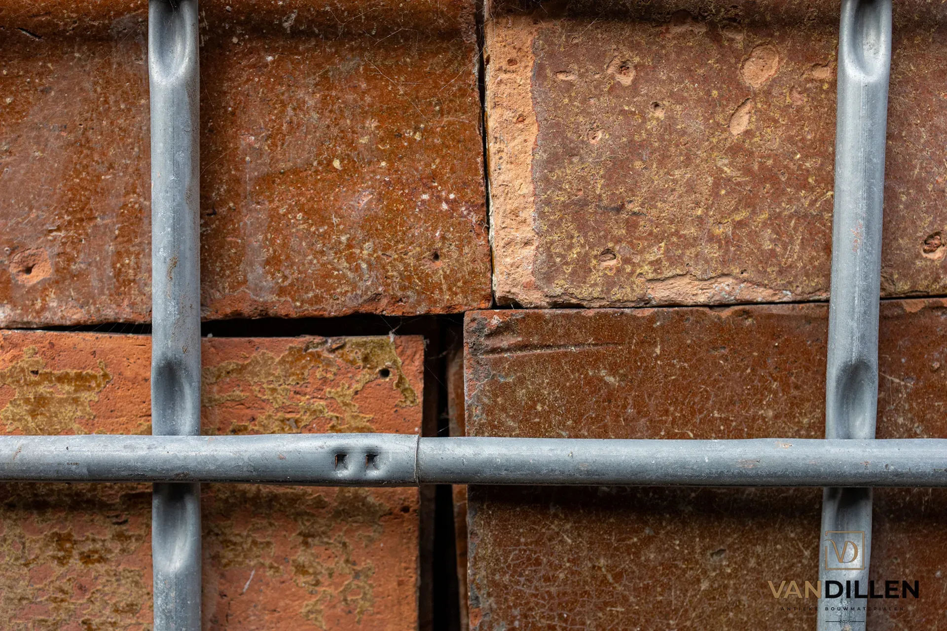 Old brown-glazed terracotta floor tiles