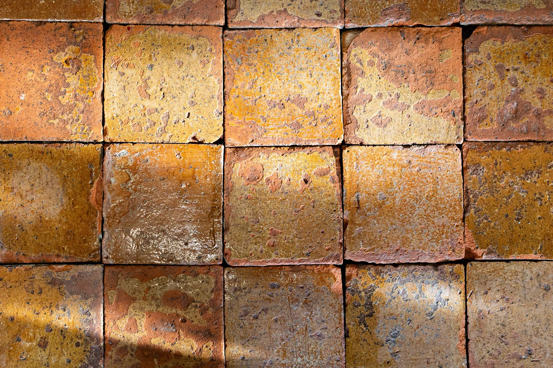 Old glazed floor tiles