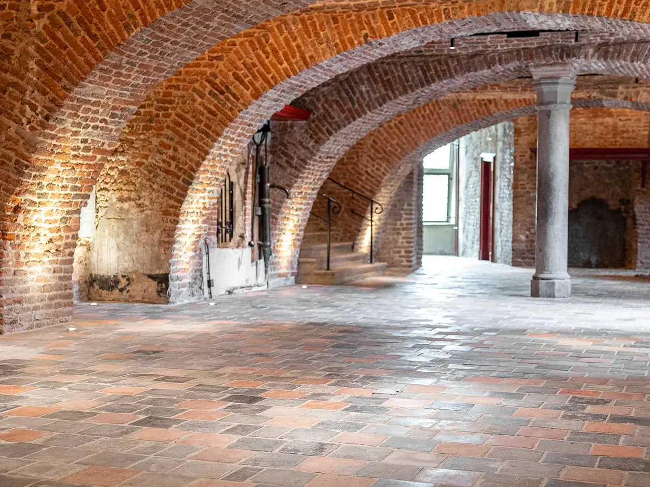 Antique handmade floor tiles with a warm, classic appearance
