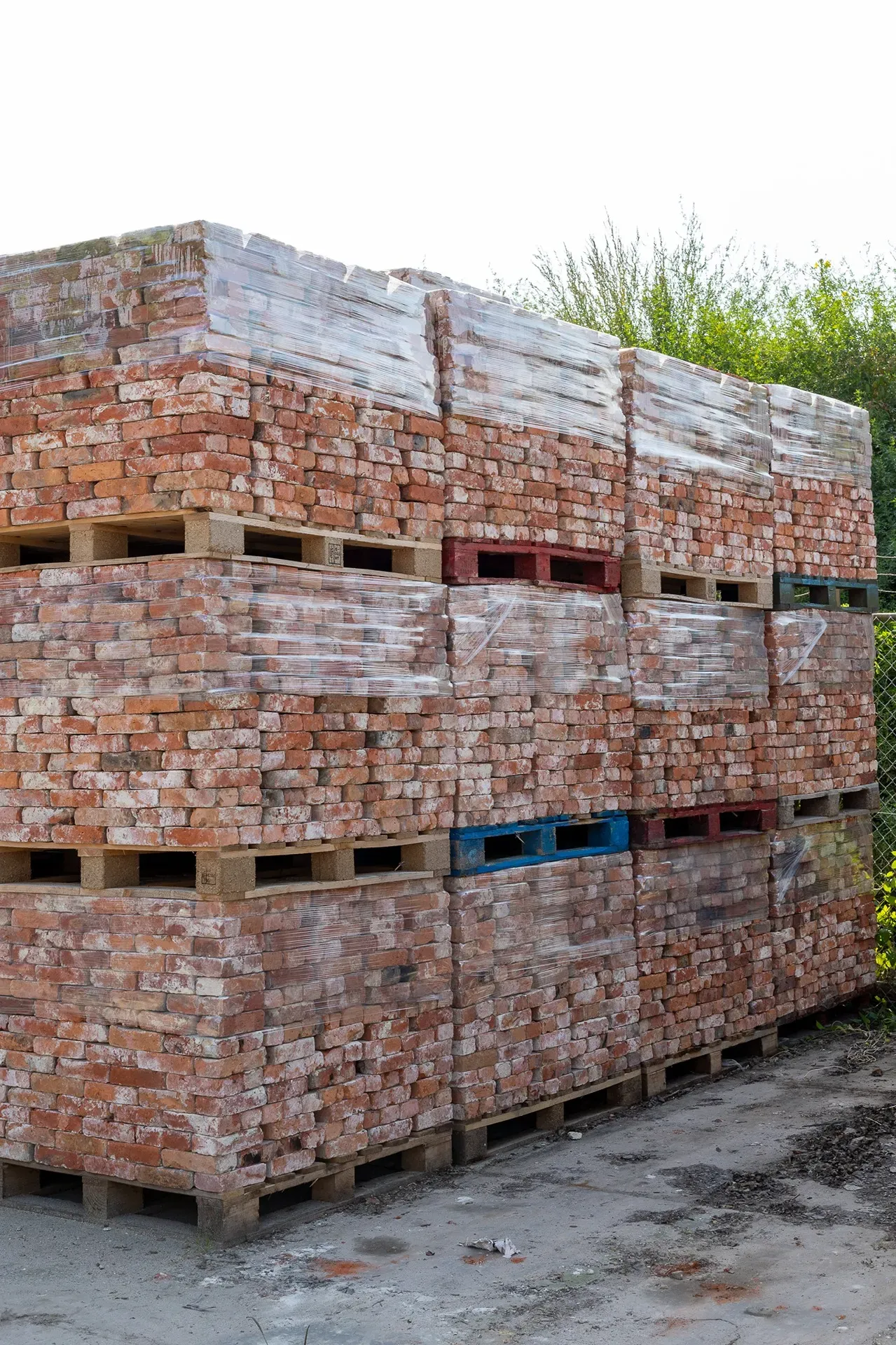 Batches of bricks cleaned of mortar